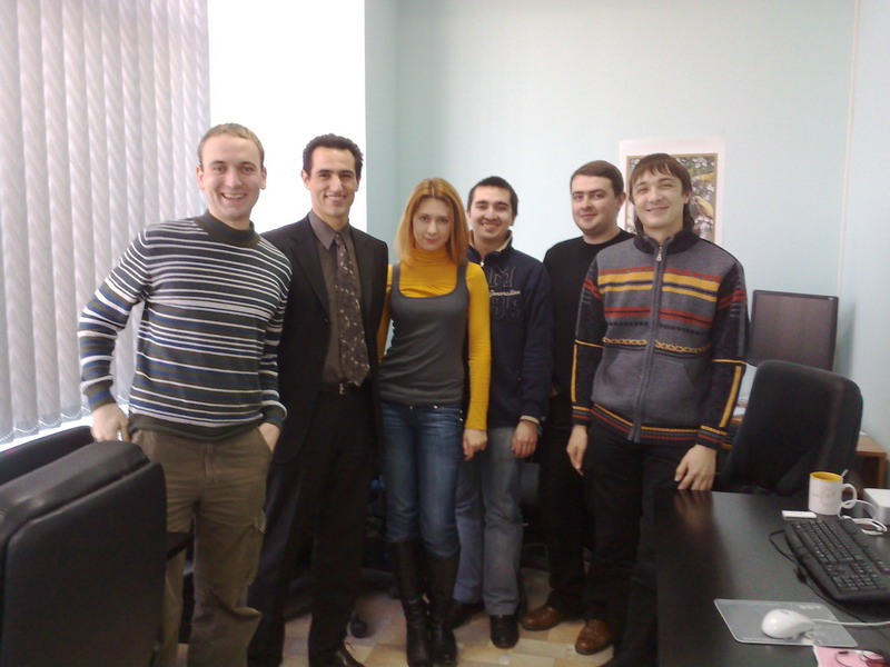 Taras and team with a customer in the Kharkiv office